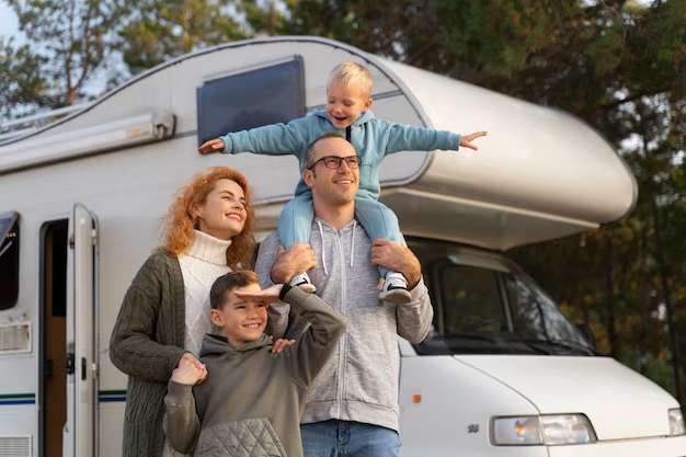 A family near an RV