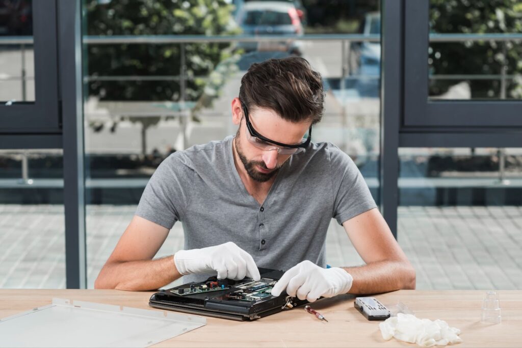 Technician repairing computer